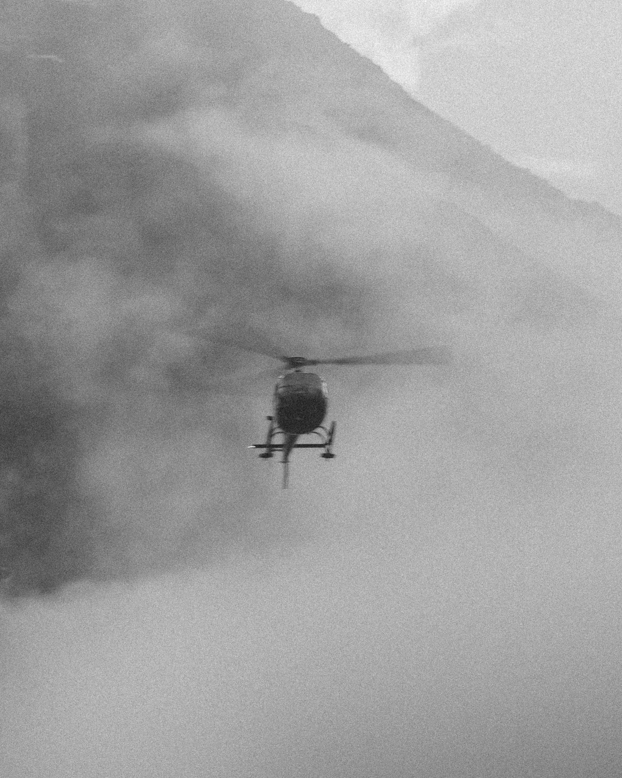 Watching a helicopter landing in the fog at Namche baazar