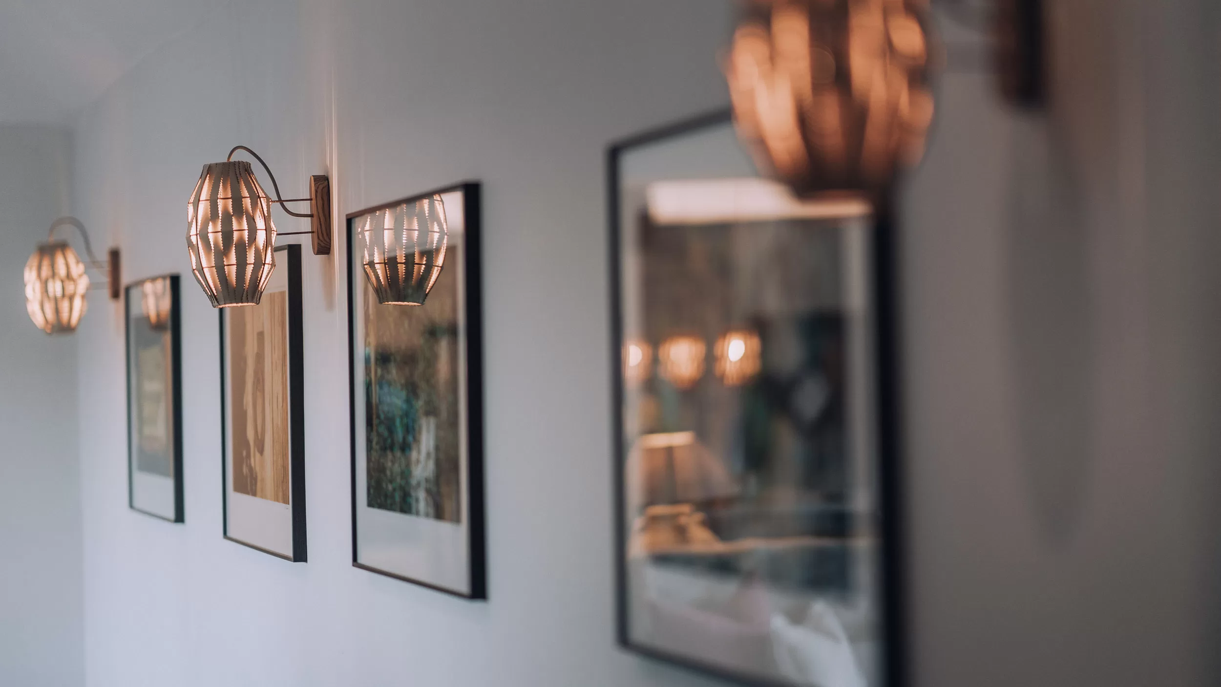 wall lights and art at Bibury Farm Barns