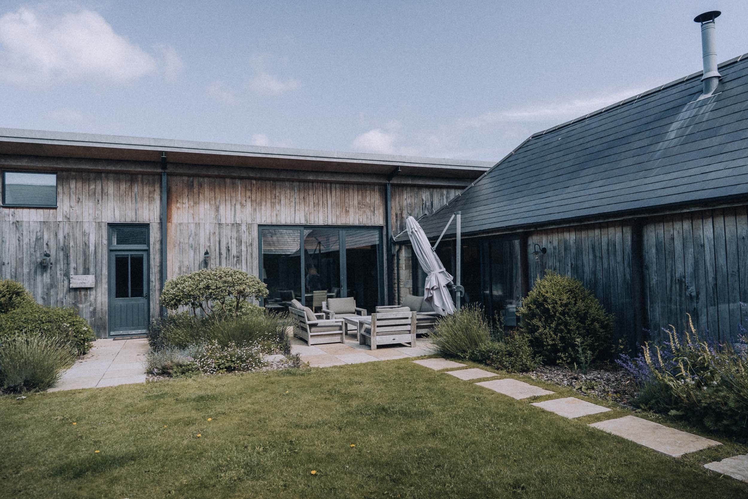 beautiful entrance area to Bibury farm barns