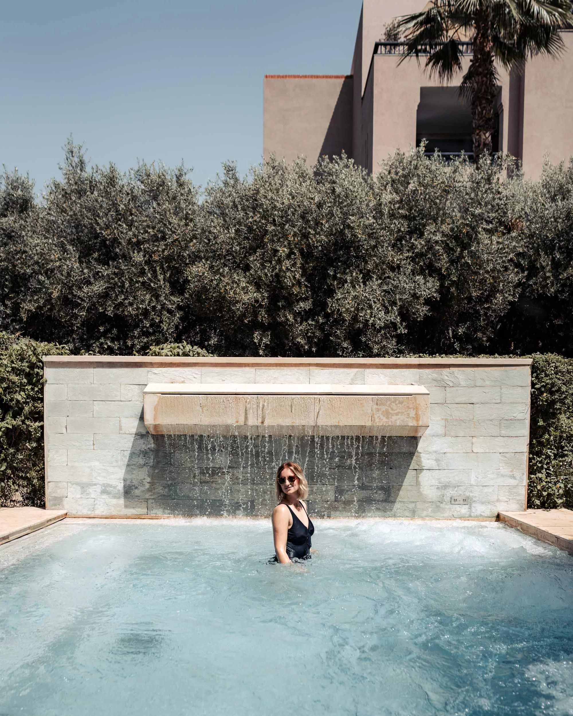 FourSeasons17 Woman in an outdoor jacuzzi